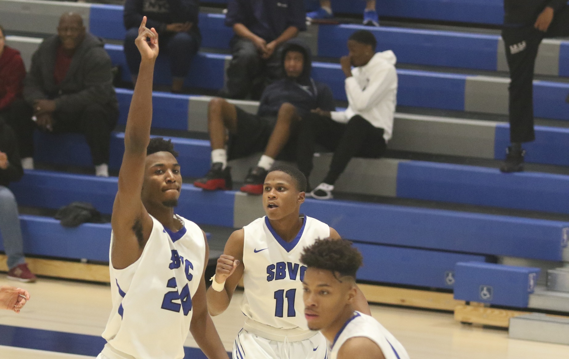 Clutch Play at End Lifts Wolverines to Next Round